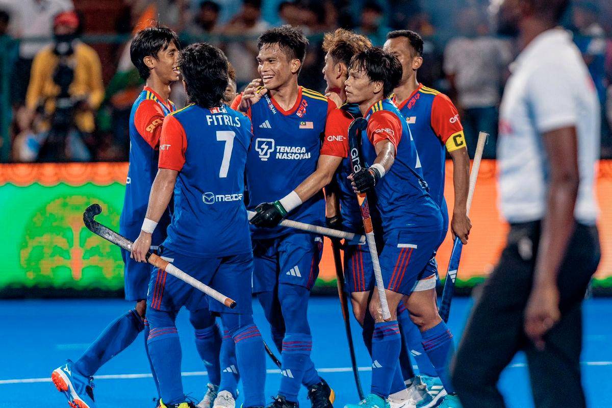 Malaysia tops Asia Cup Super Four group after 2-0 victory over China Malaysia tops Asia Cup Super Four group after 2-0 victory over China