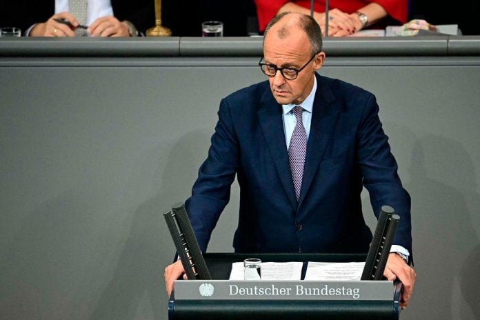 Merz to ask EU to use frozen Russian assets for Ukraine loan