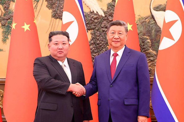 North Korea’s Kim pledges support for China’s interests in Beijing summit