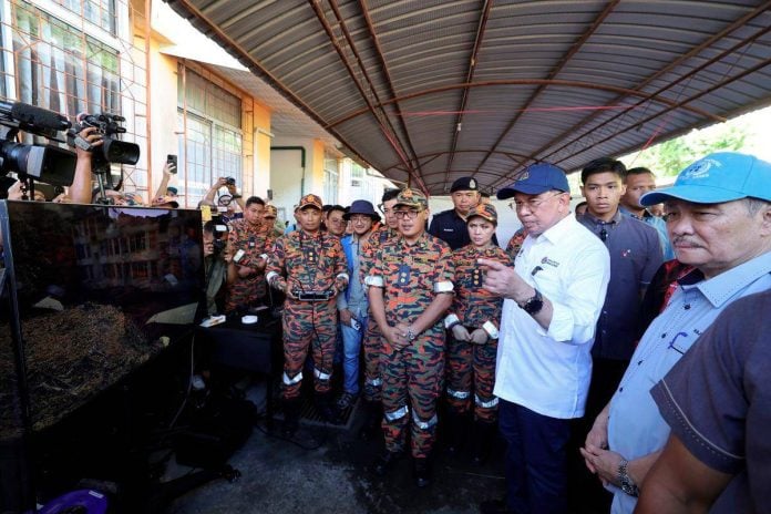 PM Anwar urges immediate infrastructure repair and aid for Sabah floods