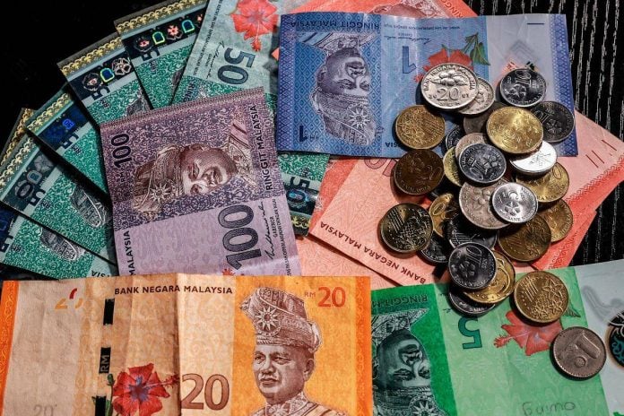 Ringgit dibuka mendatar berbanding dolar AS didorong petunjuk Fed