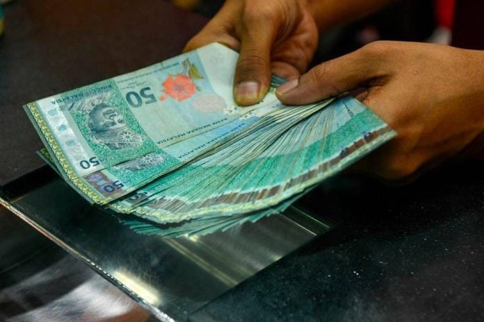 Ringgit holds steady as budget optimism balances stronger US dollar