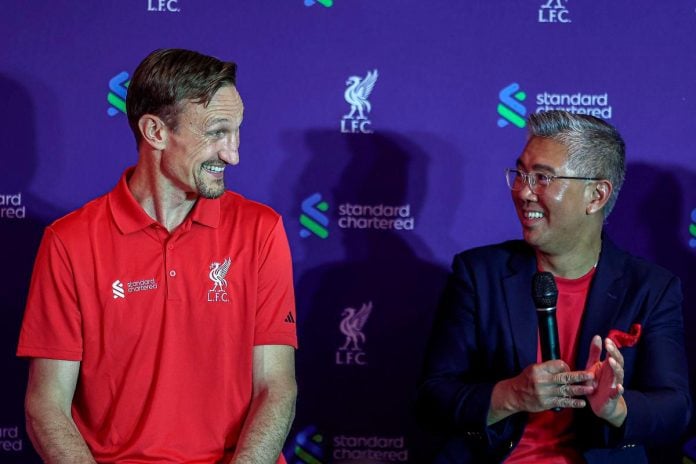 Tengku Zafrul and Liverpool’s Hyypiä share light moment at ASEAN dinner