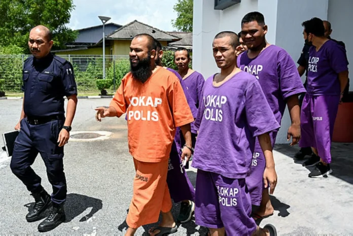 Businessman Azlan Al-Amin and brother charged over car vandalism