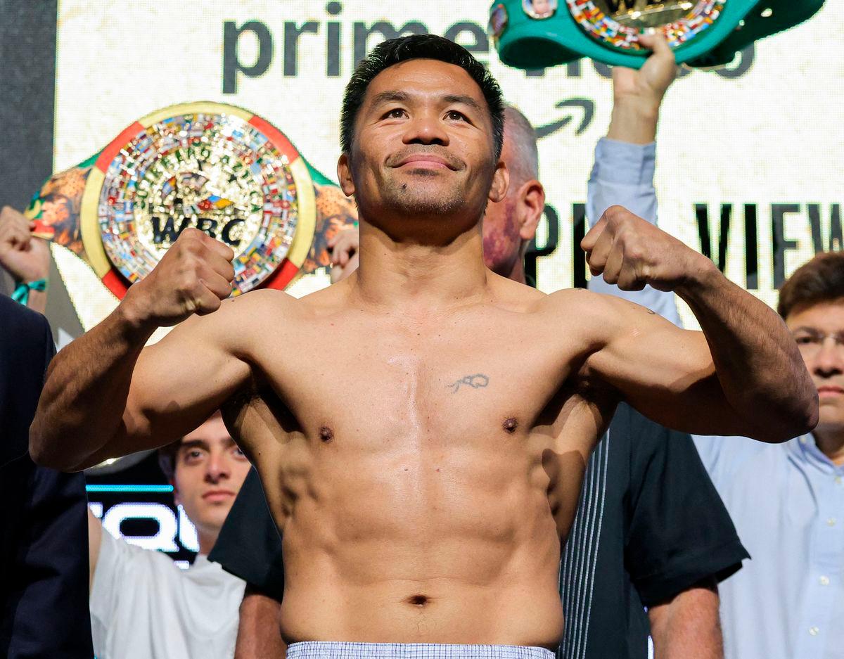 Pacquiao, Barrios make weights for Vegas showdown