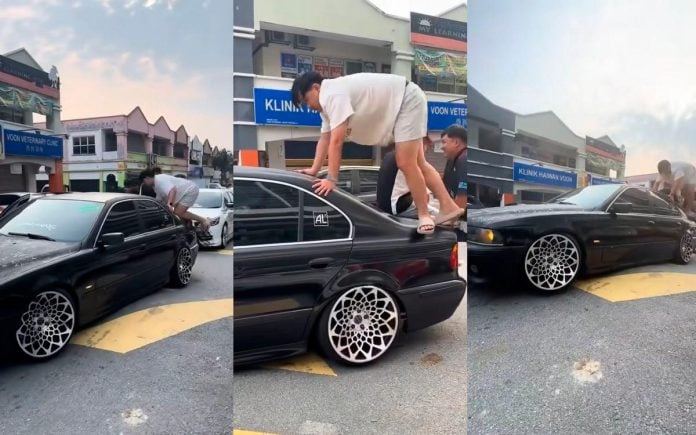 Modified BMW gets stranded on speed bump, unusual “CPR” attempt fails to revive it