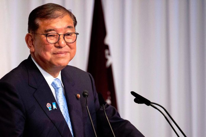 Japan PM to review details of US trade deal announced by Trump