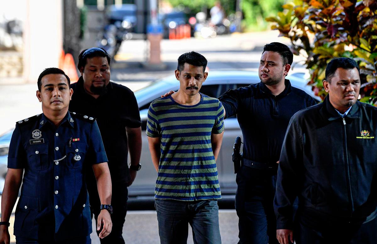Trader pleads not guilty to swinging machete at police in KL Trader pleads not guilty to swinging machete at police in KL