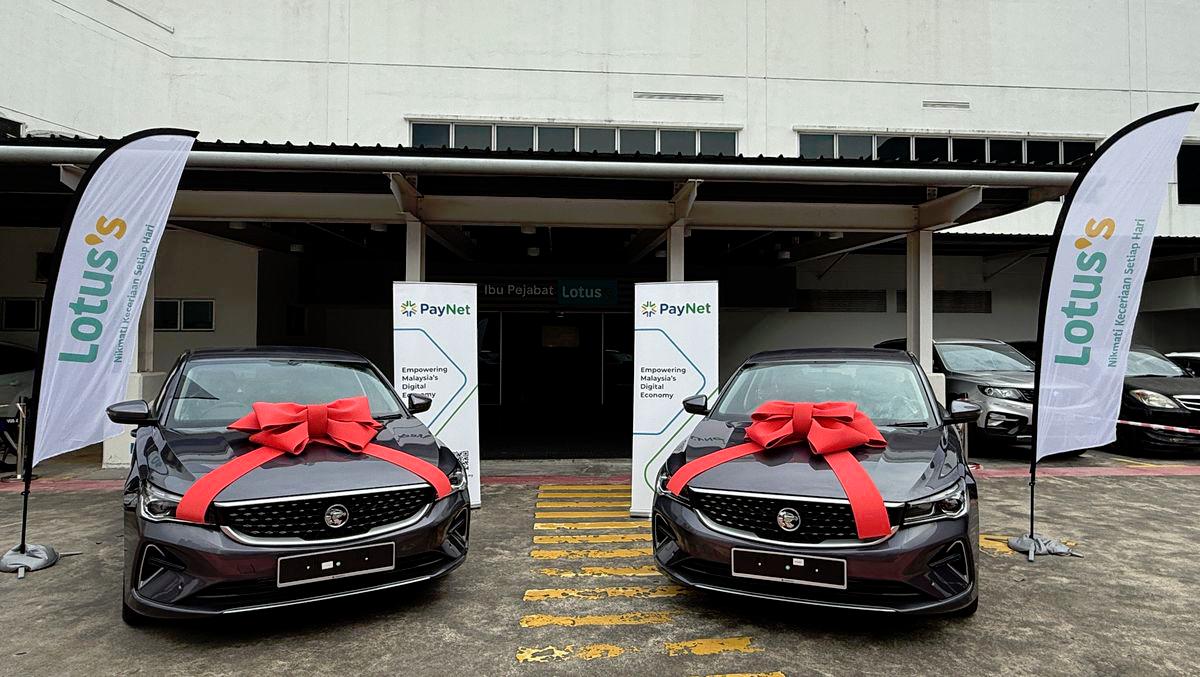 Two lucky shoppers win Proton S70 Premium in MyDebit Syiokkk Raya Contest at Lotus’s Malaysia
