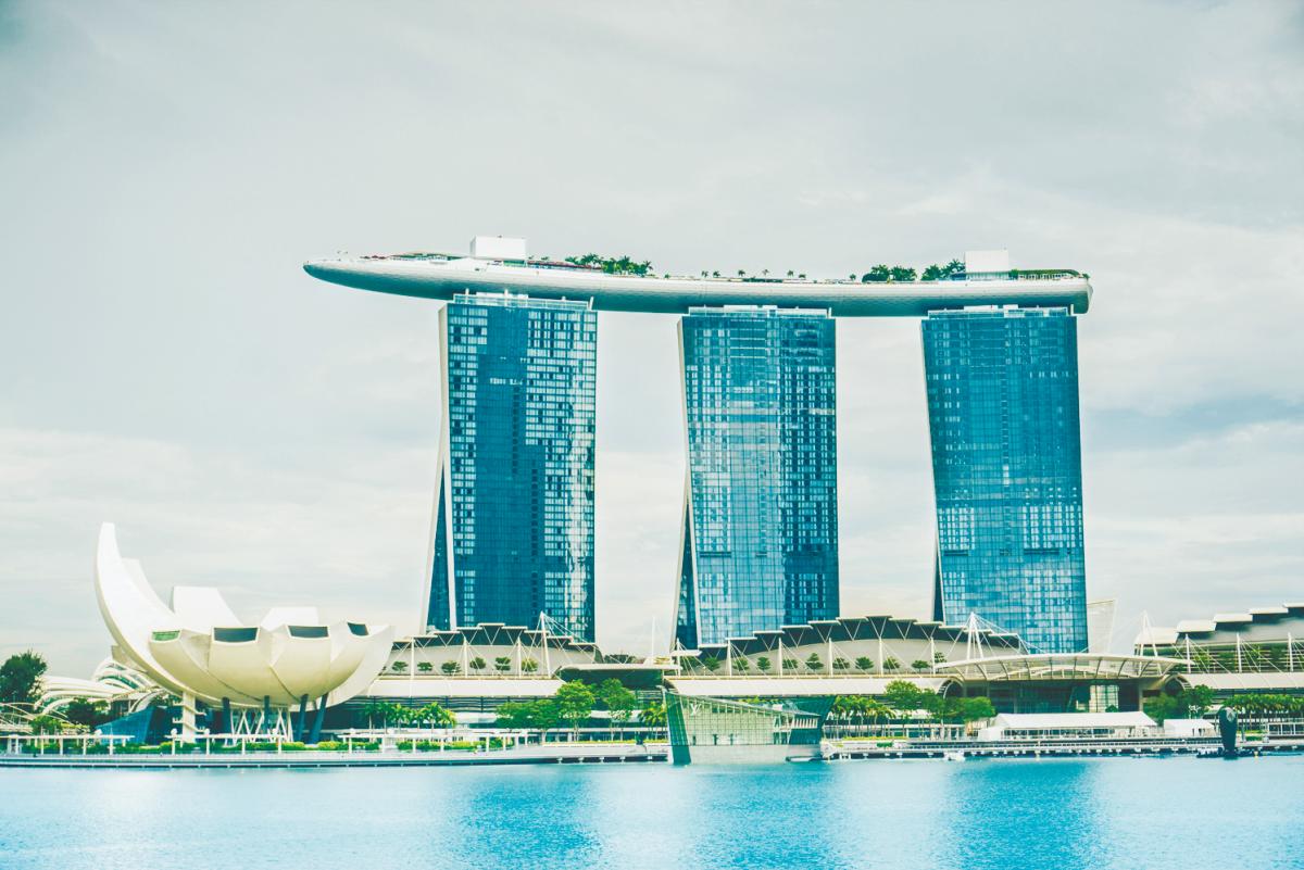 Economists split on S’pore policy path after surprise growth Economists split on S’pore policy path after surprise growth