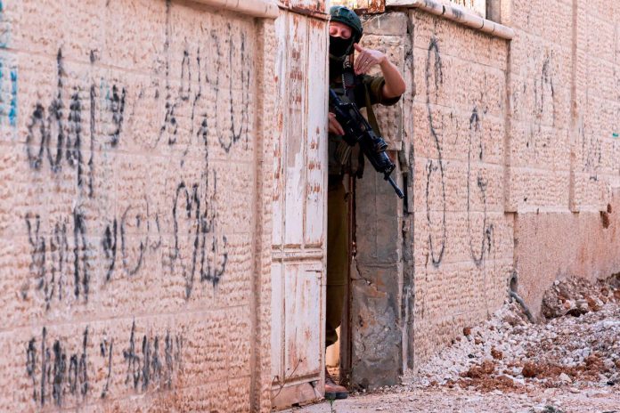 Israeli troops kill Palestinian man in West Bank stabbing incident