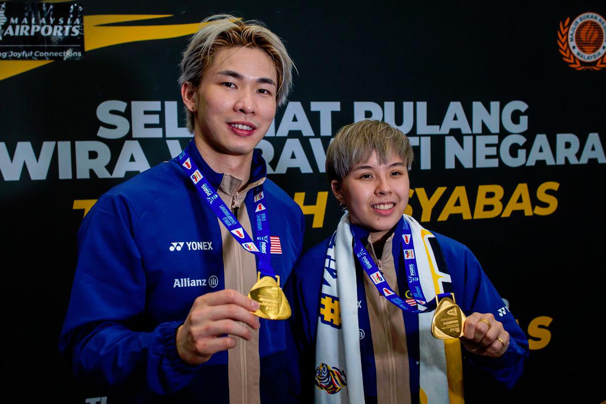 “Obstacles made him a champion,” says Tang Jie’s proud mother