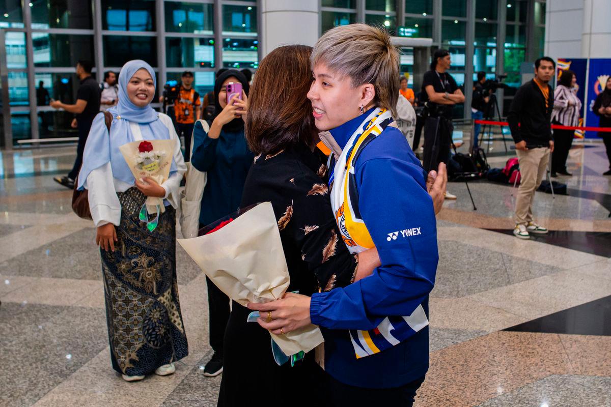 Parents proud as Tang Jie-Ee Wei return as badminton world champions Parents proud as Tang Jie-Ee Wei return as badminton world champions