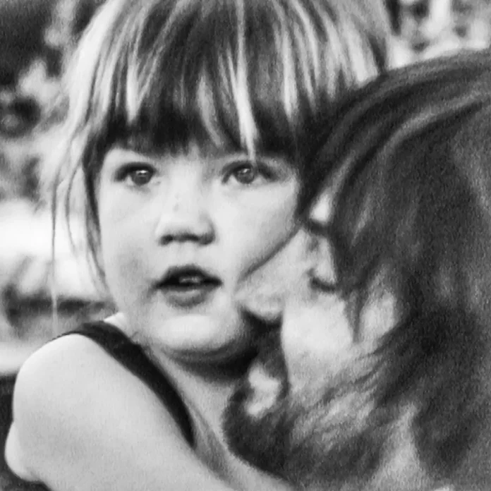 Parker with his daughter Peach featured on the album cover. Parker with his daughter Peach featured on the album cover.