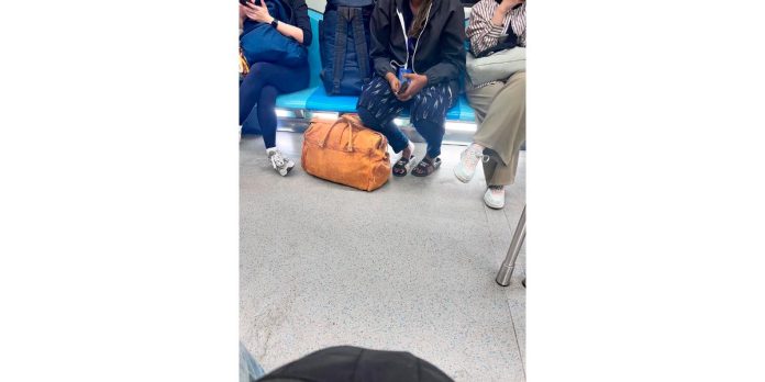 Kindness questioned as woman blocks seat with luggage, ignores pregnant commuter on MRT Kindness questioned as woman blocks seat with luggage, ignores pregnant commuter on MRT