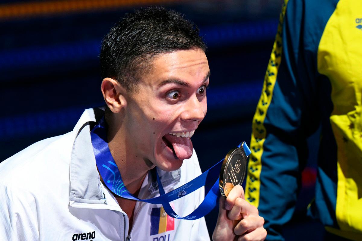 Popovici eyes beach holiday after world swim sprint double win Popovici eyes beach holiday after world swim sprint double win