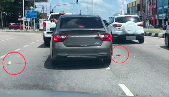 Proton Saga driver throwing durian skins on Kelantan road goes viral