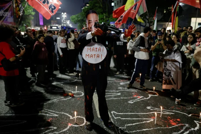 Rio police raids spark protests as authorities identify 121 dead