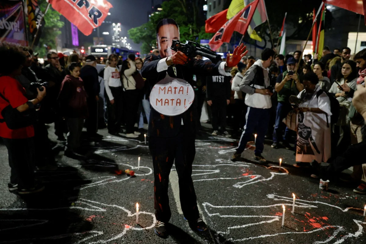 Rio police raids spark protests as authorities identify 121 dead