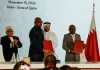 Congo's president felix tshisekedi's high representative sumbu sita mambu and head of the m23 rebel group delegation benjamin mbonimpa take part in a ceremony to sign a framework agreement for a peace deal aimed at ending fighting in eastern congo, in doha, qatar, november 15, 2025. Reuters