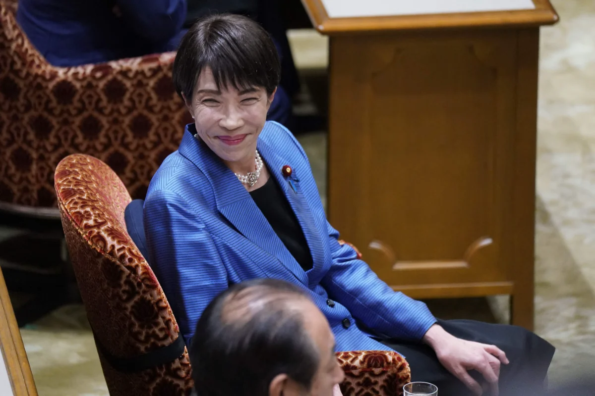 China, inflation could pop Japan PM's bubble