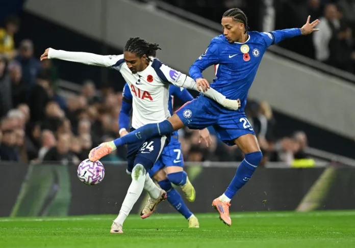 FBL-ENG-PR-TOTTENHAM-CHELSEA Chelsea's Brazilian striker #20 Joao Pedro (R) and Tottenham Hotspur's English defender #24 Djed Spence vie for the ball during the English Premier League football match between Tottenham Hotspur and Chelsea at the Tottenham Hotspur Stadium in London, on November 1, 2025.