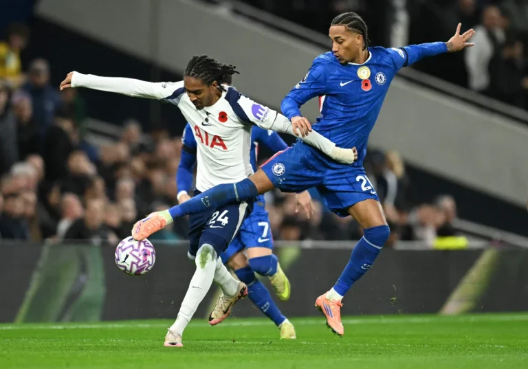FBL-ENG-PR-TOTTENHAM-CHELSEA Chelsea's Brazilian striker #20 Joao Pedro (R) and Tottenham Hotspur's English defender #24 Djed Spence vie for the ball during the English Premier League football match between Tottenham Hotspur and Chelsea at the Tottenham Hotspur Stadium in London, on November 1, 2025.