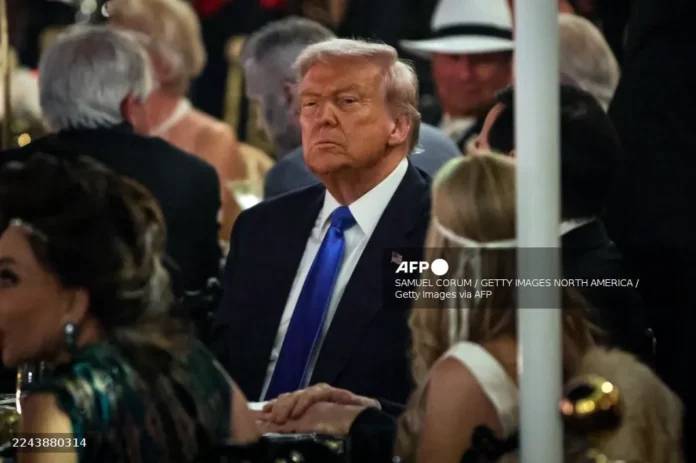 US President Donald Trump talks with guests during a Halloween party at his Mar-a-Lago estate on October 31, 2025 at Palm Beach, Florida. Trump is spending the weekend at his Mar-A-Lago estate in Palm Beach, Florida. Samuel Corum/Getty Images/AFP