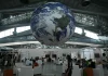 A huge globe representing the earth hangs inside a ward for ngo's and civil and social associations, at the cop30 un climate change conference premises in belem, para state, brazil on november 10, 2025. - afp pic