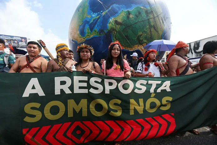 Climate protesters swelter in Brazilian sun outside COP30 summit