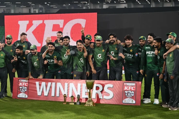 Pakistan's cricketers pose with the winning trophy at the end of third and final Twenty20 international cricket match between Pakistan and South Africa at the Gaddafi Stadium in Lahore on November 1, 2025. - AFP