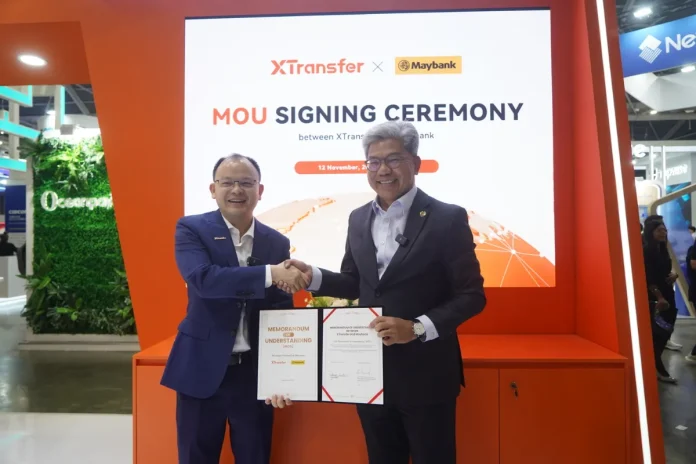 Bill Deng, Founder and CEO of XTransfer (Left) and Dato’ Sri Khairussaleh Ramli, President and Group CEO of Maybank (Right) signed MOU during Singapore Fintech Festival 2025.