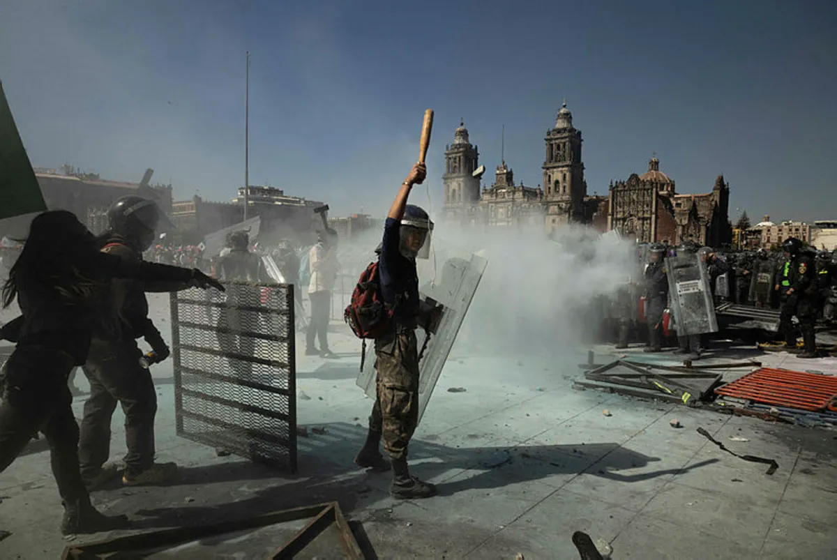 mexico-government-protest Clashes injure 120 at protest against Mexico president