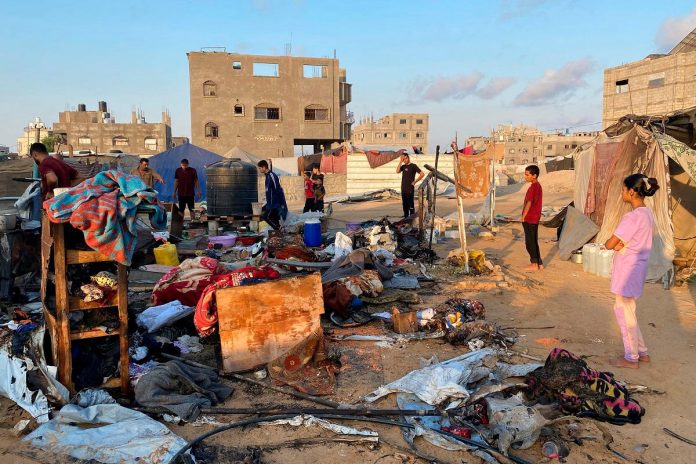 Gaza rescuers say Israeli strikes kill 14 as Trump teases ceasefire push