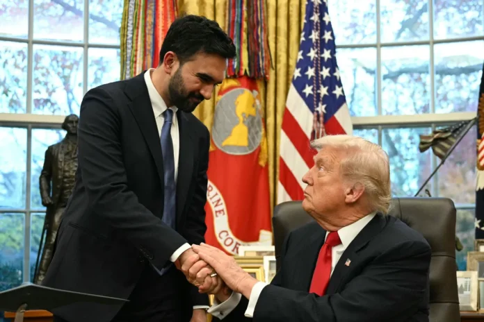 US President Donald Trump (R) shakes hands with New York Mayor-elect Zohran Mamdani as they meet in the Oval Office of the White House in Washington, DC, on November 21, 2025. (Photo by Jim WATSON / AFP)
