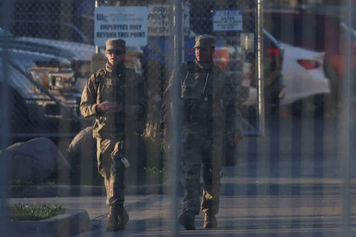 Some National Guard troops being withdrawn from Chicago and Portland, official says