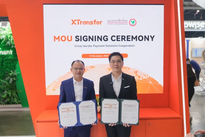 Bill Deng, Founder and CEO of XTransfer (Left) and Dr Karin Boonlertvanich, Executive Vice President - Corporate Strategy and Innovation Division Head at KBank (Right), signed an MOU during the Singapore Fintech Festival.