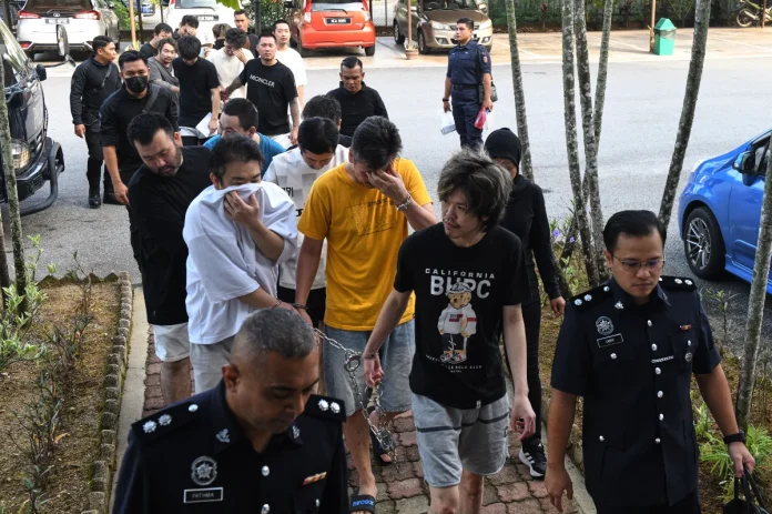 18_Japanese_and_Chinese_nationals_plead_not_guilty_to_online_fraud_charges