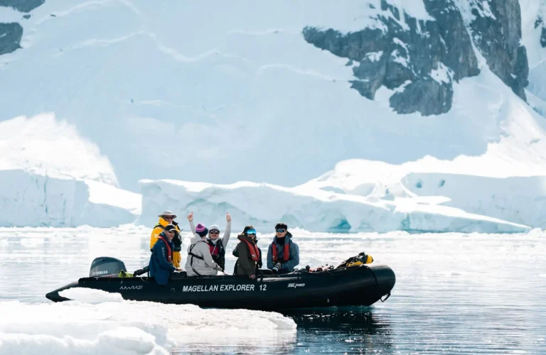 Passengers travel by Zodiac during an Antarctica21 expedition, part of the company’s air-cruise model that flies guests into Antarctica before exploring the Antarctic Peninsula by ship.