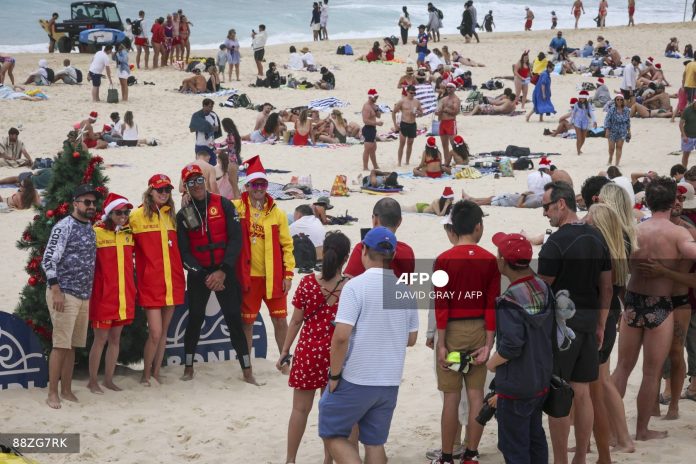 AUSTRALIA-CHRISTMAS-BONDI Bondi Beach attack hero says wanted to protect 'innocent people'