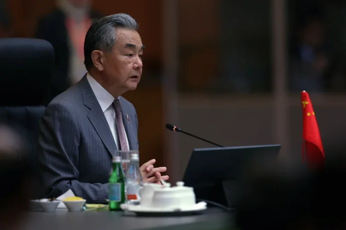 China vows forceful response to US arms sales and Taiwan drills