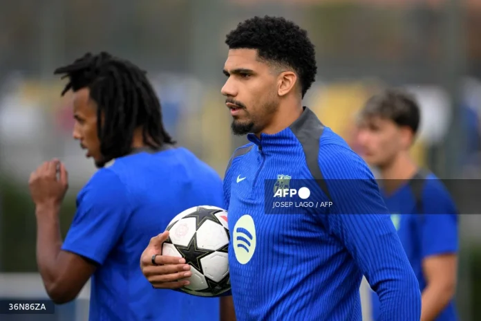 Barcelona's Araujo returns to training ahead of Catalan derby