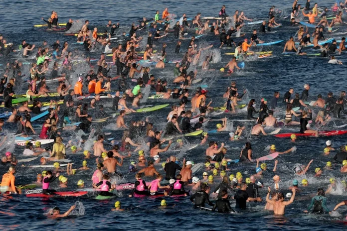 Bondi Beach swim honours victims of Sydney festival shooting