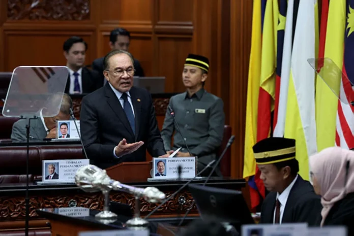 Malaysia's national debt being repaid in stages to avoid disrupting development