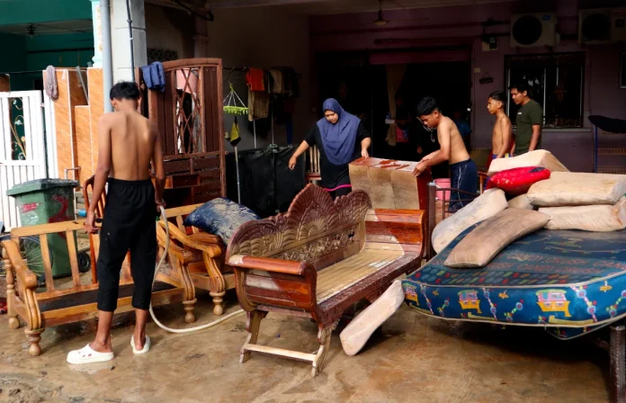 Kuantan flood victims return home as waters recede, begin clean-up
