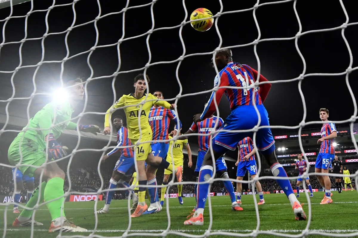 Tottenham Hotspur's English midfielder #14 Archie Gray (C) heads in the opening goal during the English Premier League football match between Crystal Palace and Tottenham Hotspur at Selhurst Park in south London on December 28, 2025.