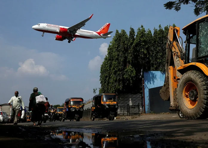 Air India 777 aircraft turns back after drop in engine oil pressure, regulator says