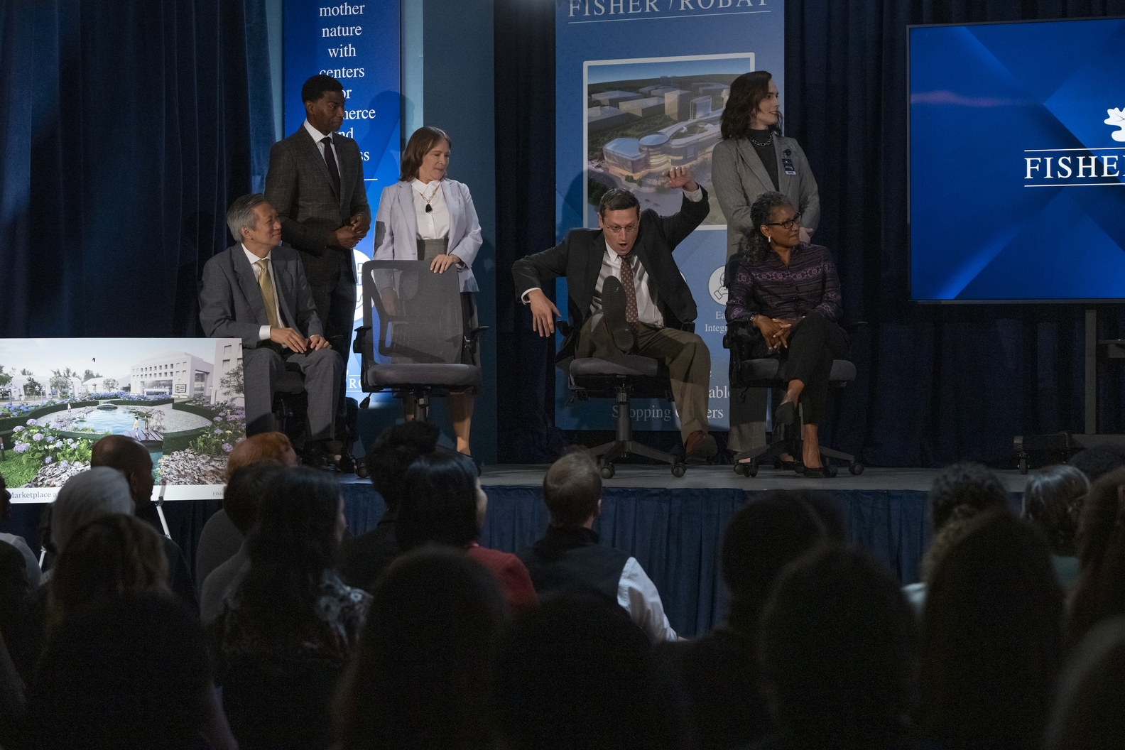 Ron’s chair giving out during a major ceremony, thus beginning his descent into madness and conspiracy. – PICS FROM IMDB