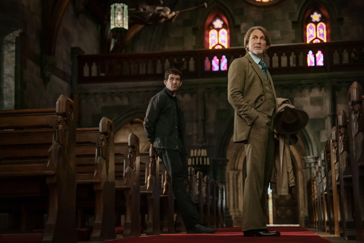 O’connor as father jud (left) and craig as detective benoit in the church, the scene of the murder at the centre of wake up dead man.
