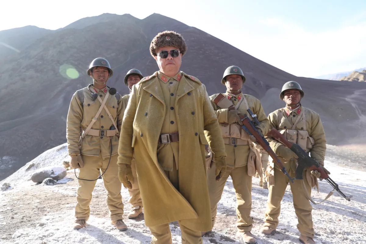 memeti Seng takes on the role of Major Memeti (centre), adding weight to the film’s antagonist lineup.
